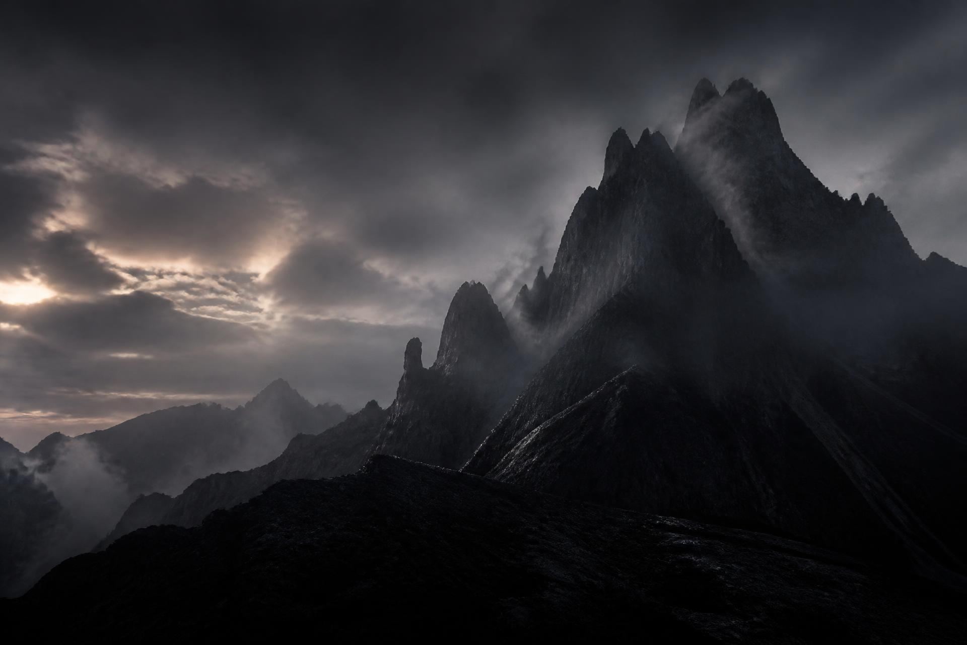Dark misty mountains at dusk